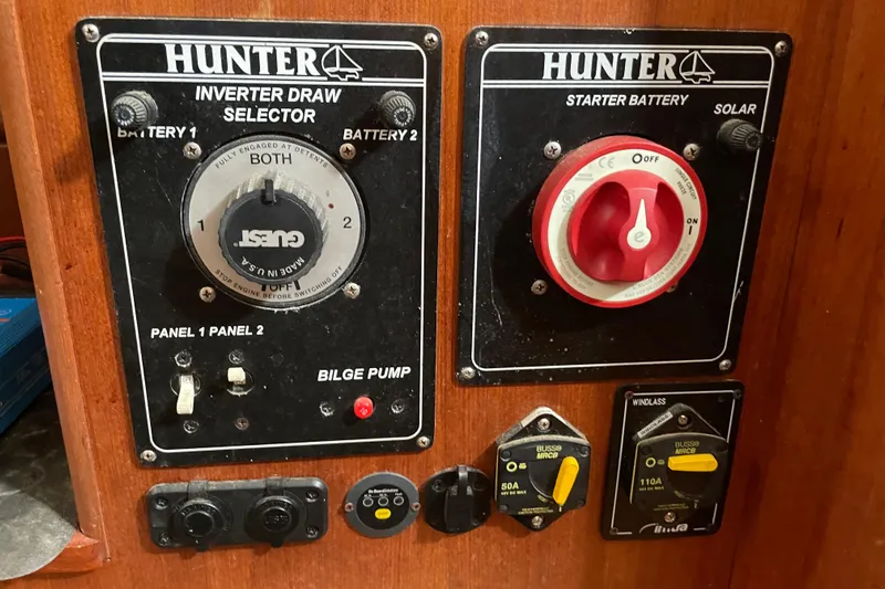 Yacht Photos Pics Control panel of a 1999 Hunter 460 boat with battery and bilge pump switches.
