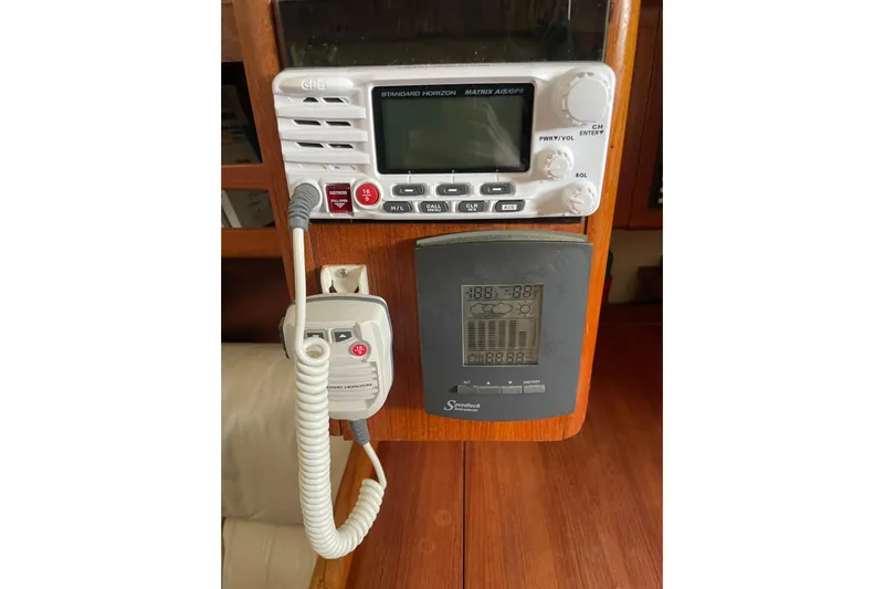  Yacht Photos Pics VHF radio and control panel on a 1999 Hunter 460 sailboat.