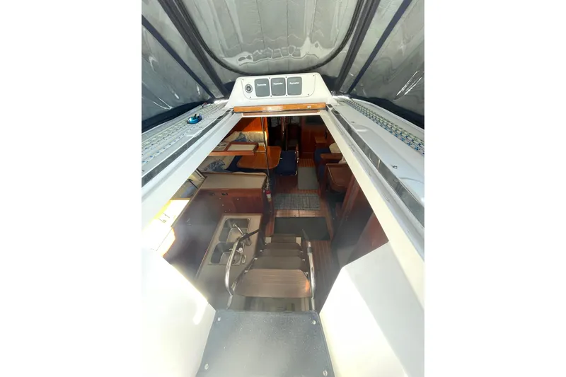  Yacht Photos Pics Interior view of 1999 Hunter 460 sailboat, showing cabin and galley area.