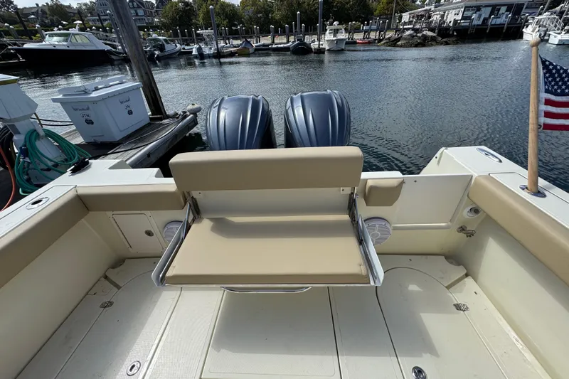  Yacht Photos Pics 2026 NorthCoast 285 HT boat with dual engines, docked at a marina.