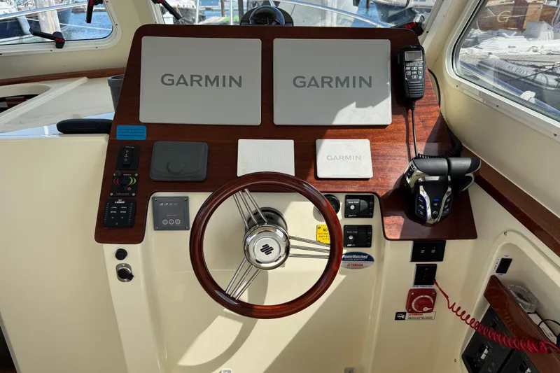  Yacht Photos Pics Helm of 2026 NorthCoast 285 HT boat with Garmin navigation system and controls.