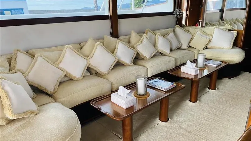  Yacht Photos Pics Luxurious interior of 2005 Explorer Motor Yachts 28M with plush seating and elegant decor.