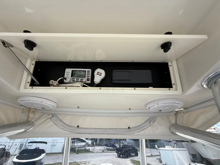  Yacht Photos Pics 2014 Jupiter 30 FS boat console with radio equipment and speakers.