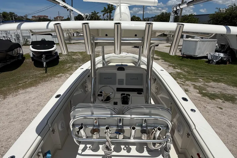  Yacht Photos Pics 2014 Jupiter 30 FS boat interior with steering console and rod holders.