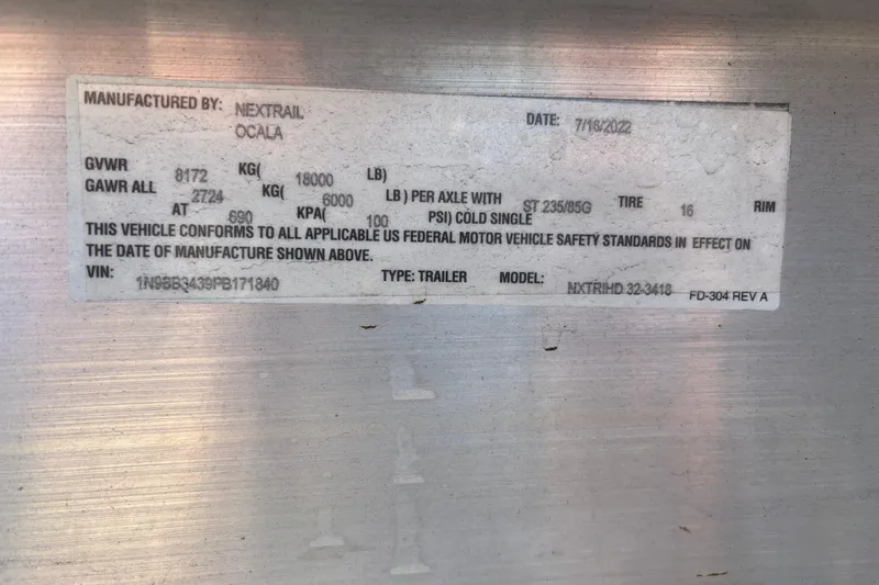 Liberty Call Yacht Photos Pics Label on a Nextrail trailer, detailing weight specifications and compliance information.