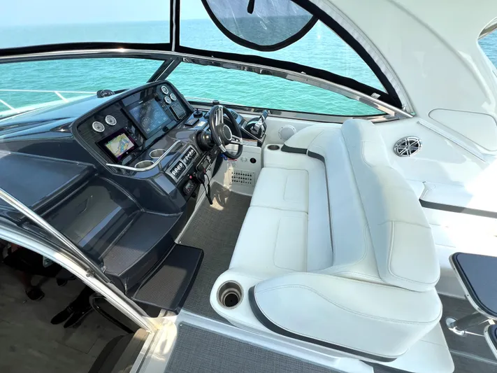  Yacht Photos Pics 2017 Formula 37 Performance Cruiser cockpit with white seating and modern dashboard.