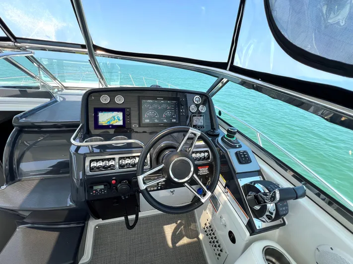  Yacht Photos Pics 2017 Formula 37 Performance Cruiser helm with navigation system and ocean view.