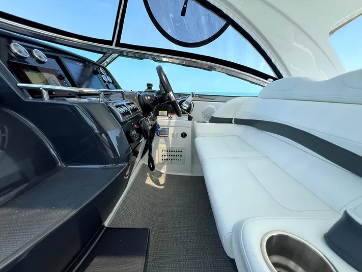  Yacht Photos Pics 2017 Formula 37 Performance Cruiser interior with white seating and modern dashboard.