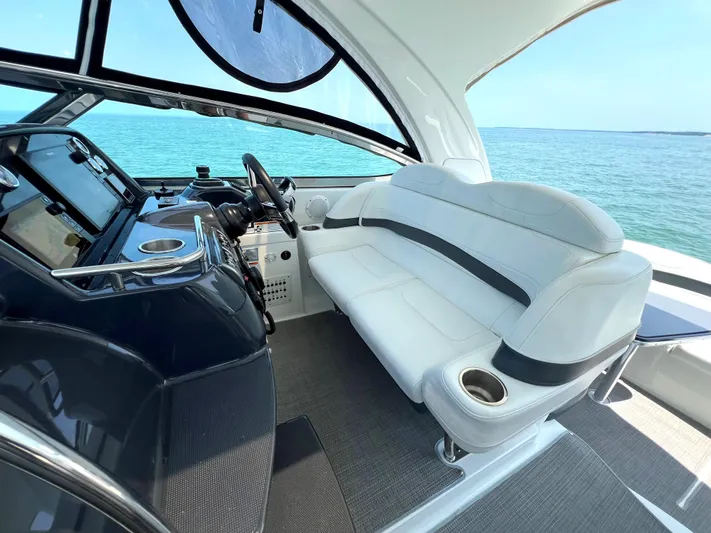  Yacht Photos Pics 2017 Formula 37 Performance Cruiser interior with white seating and ocean view.