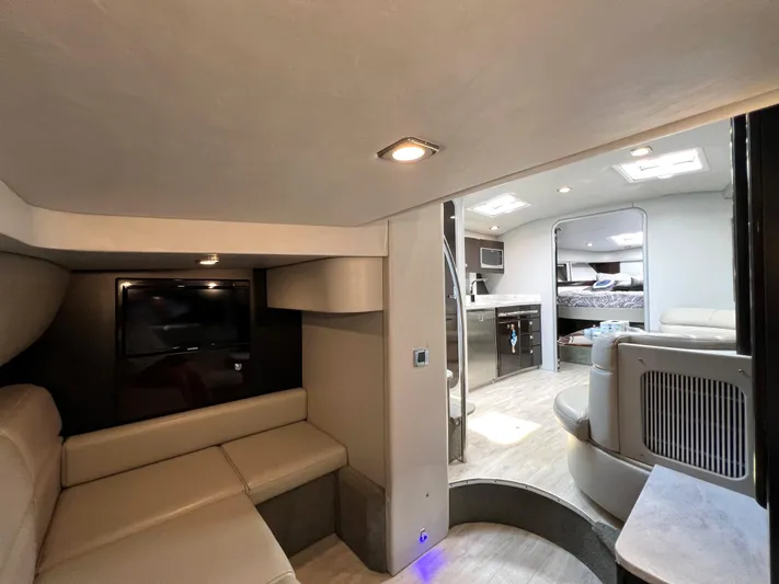  Yacht Photos Pics Interior of a 2017 Formula 37 Performance Cruiser with modern seating and a cozy cabin.