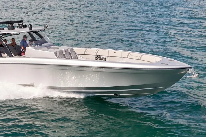  Yacht Photos Pics 2018 Midnight Express 43 Open boat cruising on clear blue water.