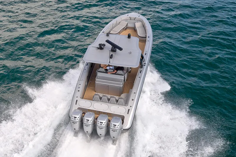 Yacht Photos Pics 2018 Midnight Express 43 Open boat cruising on ocean with four powerful engines.