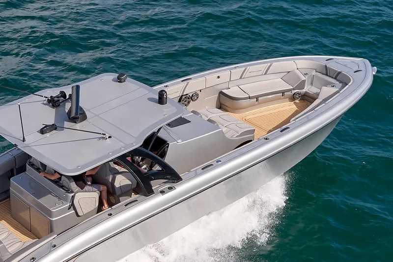  Yacht Photos Pics 2018 Midnight Express 43 Open boat cruising on clear blue water.