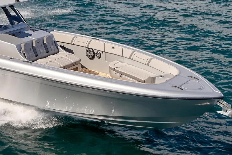  Yacht Photos Pics 2018 Midnight Express 43 Open boat cruising on clear blue water.