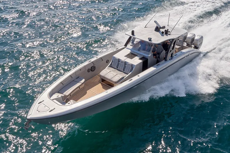  Yacht Photos Pics 2018 Midnight Express 43 Open boat cruising on ocean waters.