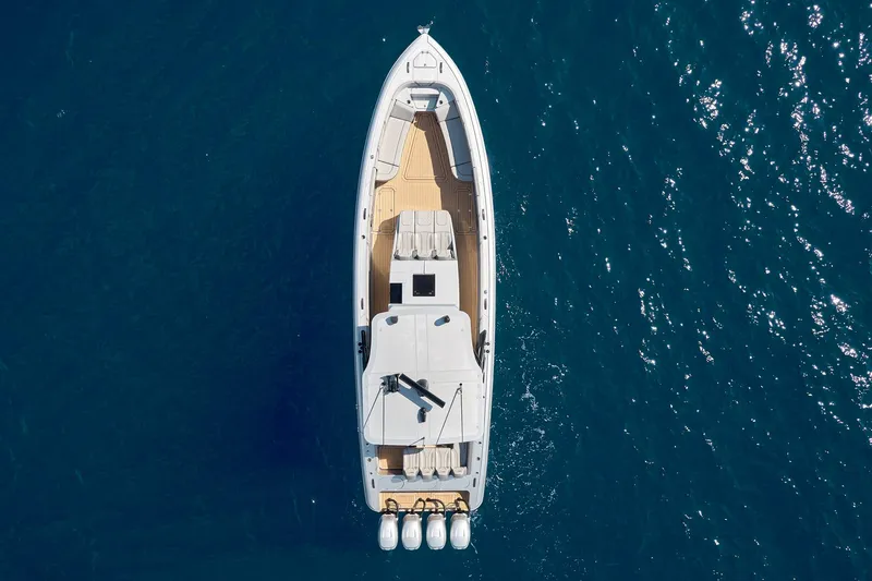  Yacht Photos Pics Aerial view of 2018 Midnight Express 43 Open boat on blue water.