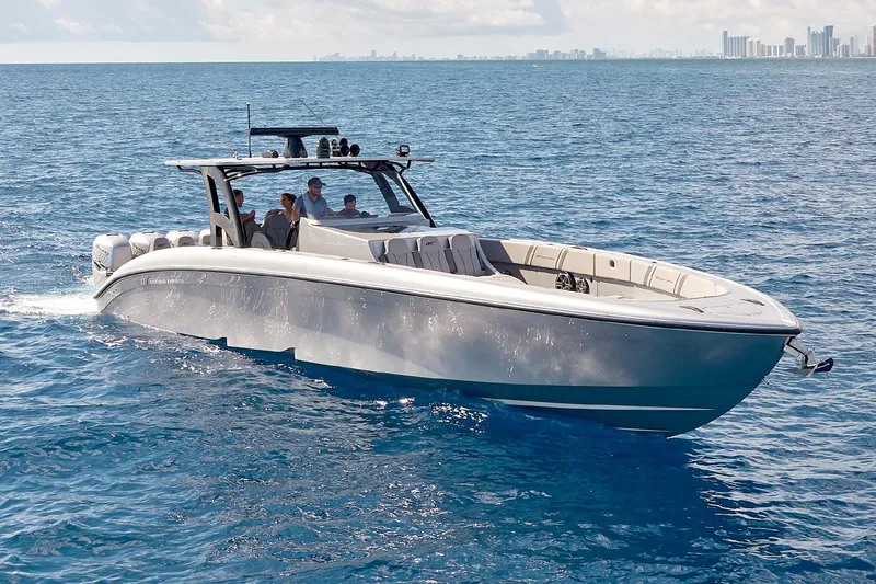  Yacht Photos Pics 2018 Midnight Express 43 Open boat cruising on blue ocean waters.