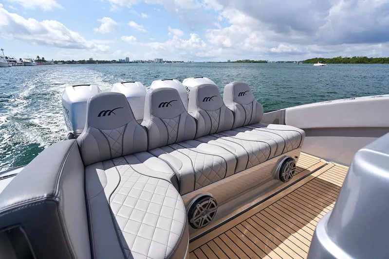  Yacht Photos Pics Luxurious seating on a 2018 Midnight Express 43 Open boat, cruising on a sunny day.