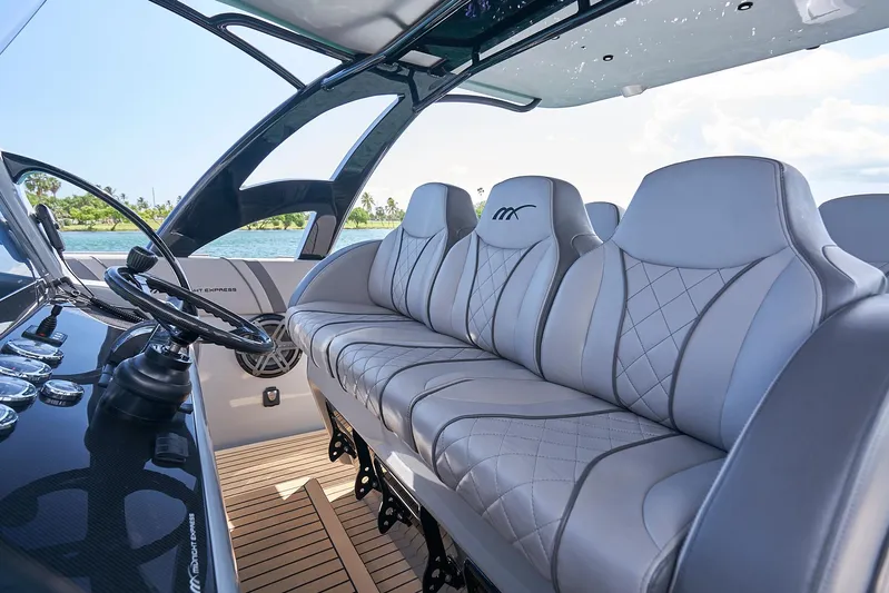  Yacht Photos Pics 2018 Midnight Express 43 Open boat interior with luxurious seating and modern dashboard.