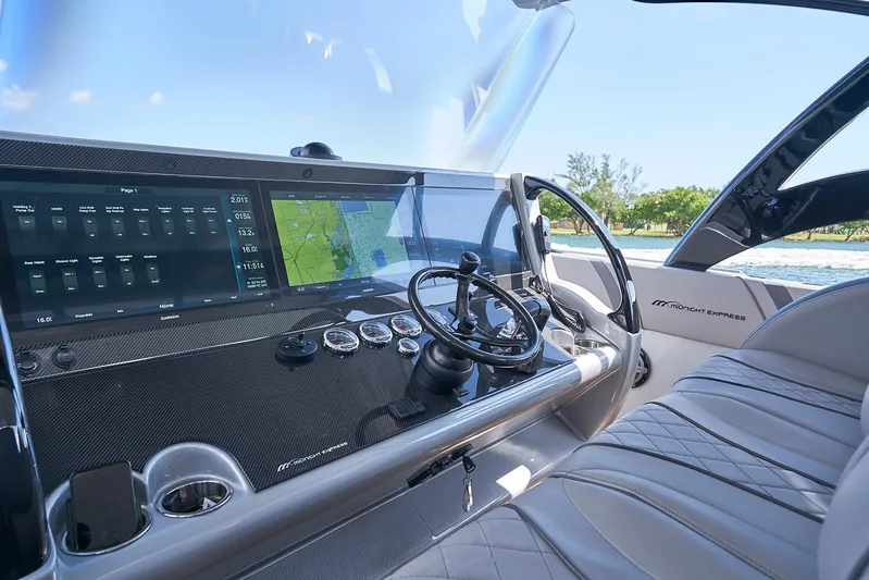  Yacht Photos Pics Cockpit of 2018 Midnight Express 43 Open boat with advanced navigation system.
