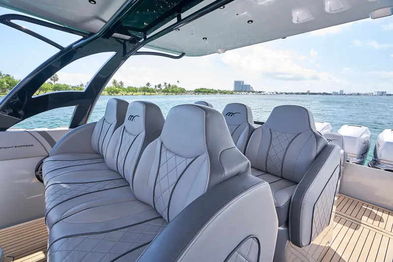  Yacht Photos Pics 2018 Midnight Express 43 Open boat interior with luxurious seating and scenic ocean view.