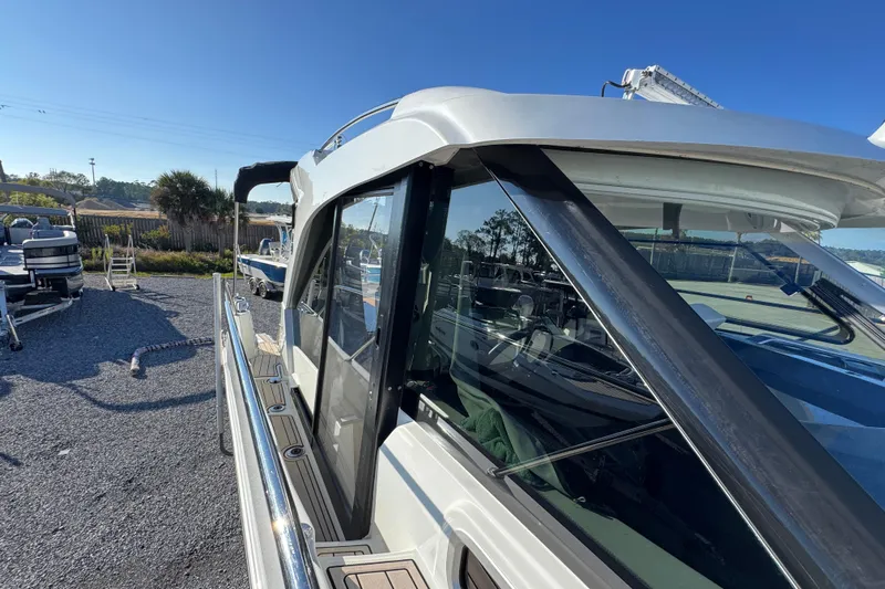  Yacht Photos Pics 2020 Beneteau Antares 27 boat docked, showcasing sleek design and modern features.