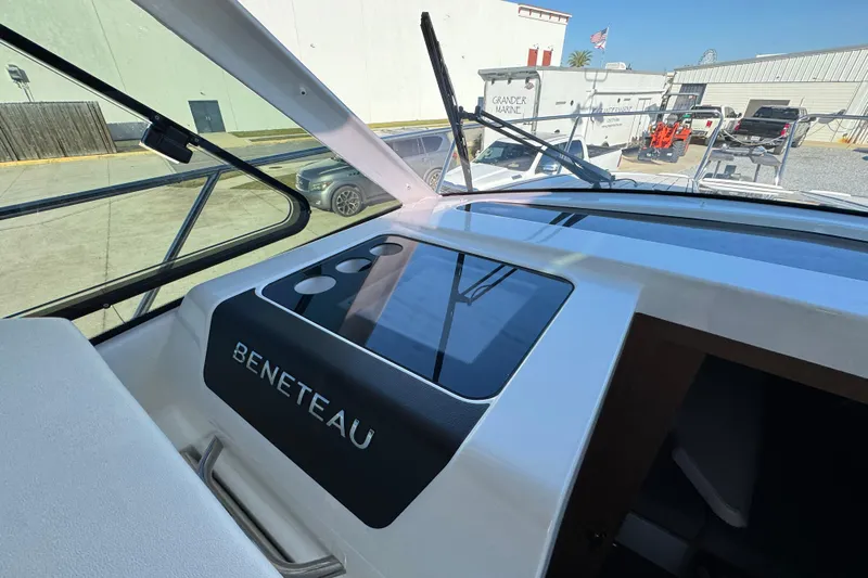  Yacht Photos Pics Interior view of 2020 Beneteau Antares 27 boat dashboard with logo.