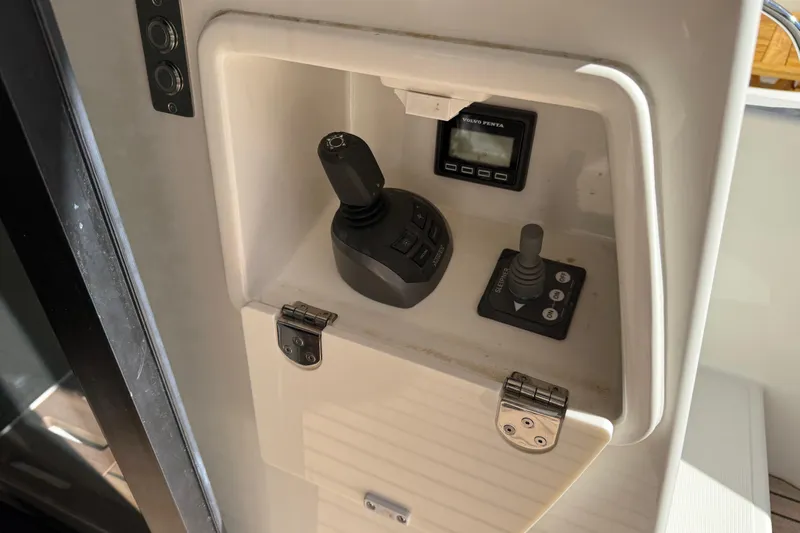 Ava Hana Yacht Photos Pics 2024 Prestige F4.9 boat control panel with joystick and display.