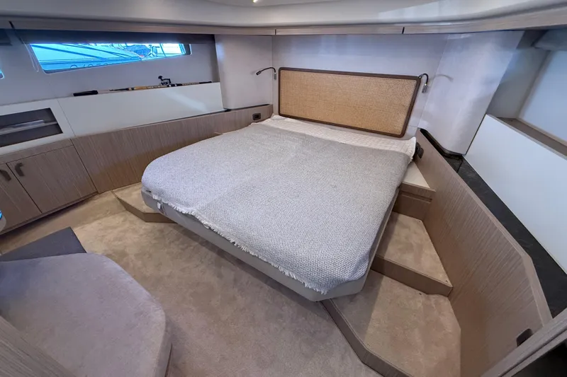 Ava Hana Yacht Photos Pics Luxurious cabin interior of 2024 Prestige F4.9 yacht with modern design and cozy bed.