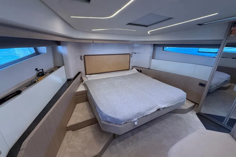 Ava Hana Yacht Photos Pics Luxurious 2024 Prestige F4.9 yacht bedroom with modern design and ambient lighting.