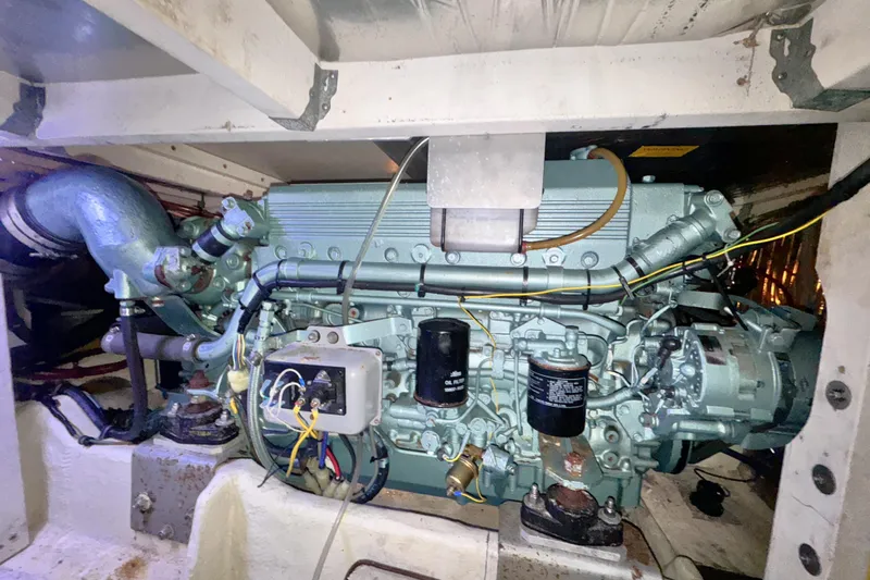  Yacht Photos Pics 1989 Bayliner 4588 Pilothouse engine compartment showcasing marine engine components.