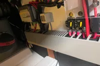 Electrical panel inside a 2016 Beneteau Swift Trawler 44, showcasing wiring and components.