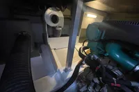 Engine room of a 2016 Beneteau Swift Trawler 44, showcasing mechanical components.