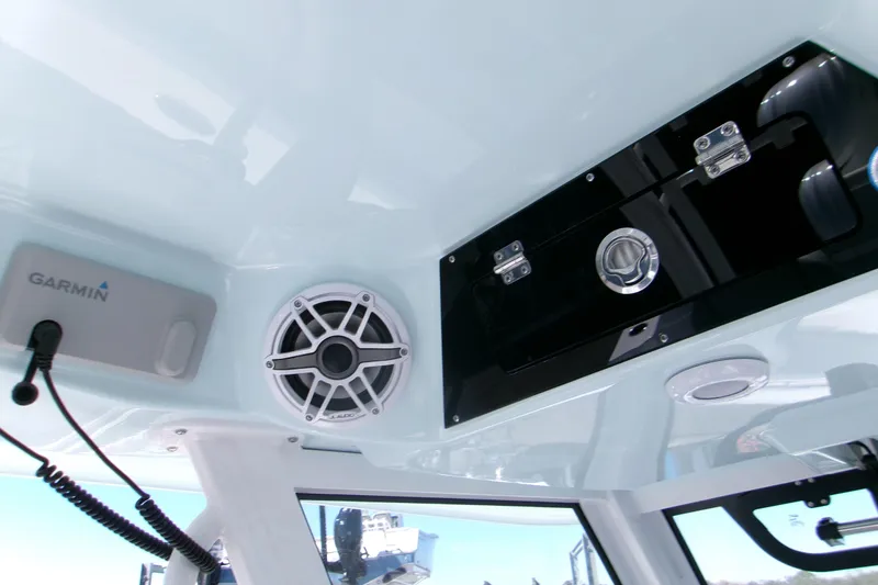  Yacht Photos Pics Interior of 2026 Sportsman Heritage 321 Center Console with Garmin equipment and speaker.