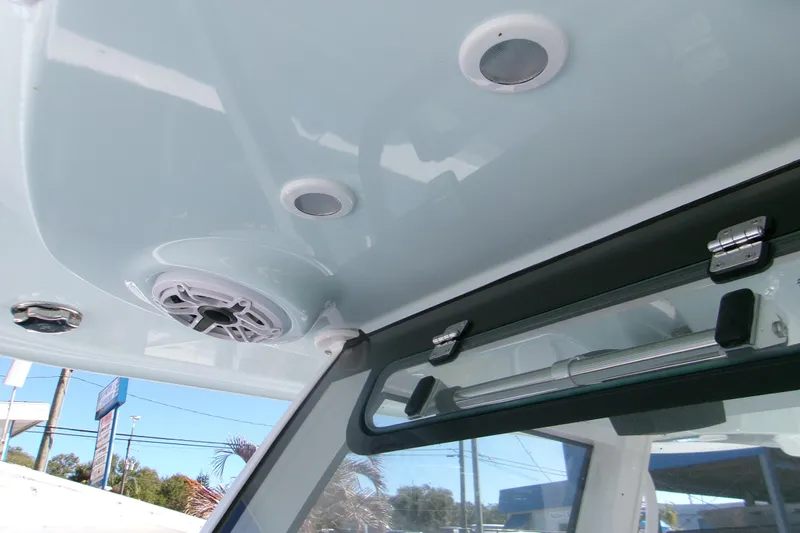  Yacht Photos Pics 2026 Sportsman Heritage 321 Center Console interior ceiling with speakers and hatch.