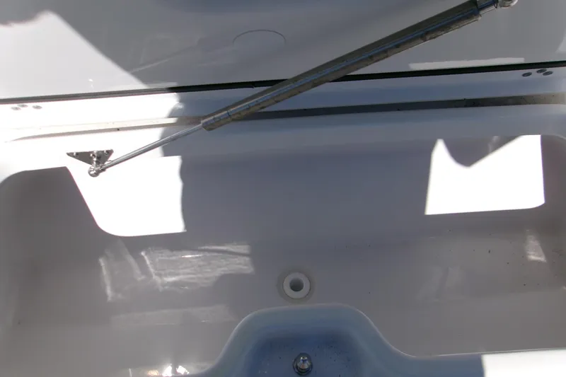  Yacht Photos Pics Open storage compartment on 2026 Sportsman Heritage 321 Center Console boat.