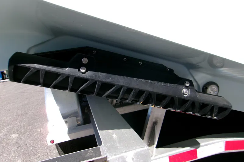  Yacht Photos Pics 2026 Sportsman Heritage 321 Center Console boat hull detail on trailer.