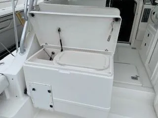 Pathological Yacht Photos Pics Open storage compartment on a 2000 Pursuit 3400 Express boat.