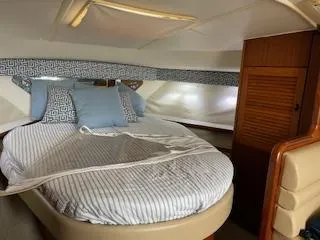Pathological Yacht Photos Pics Pursuit 3400 Express 2000 cabin with cozy bed.