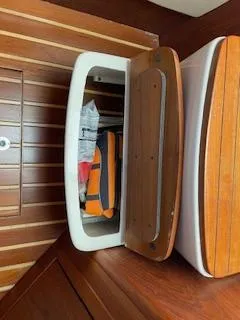 Pathological Yacht Photos Pics Interior of 2000 Pursuit 3400 Express with storage compartment.