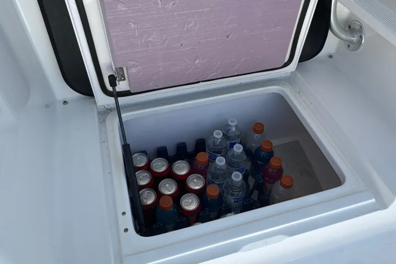 On The Ball Yacht Photos Pics Cooler on 2006 Viking 56 Convertible boat with drinks and water bottles.