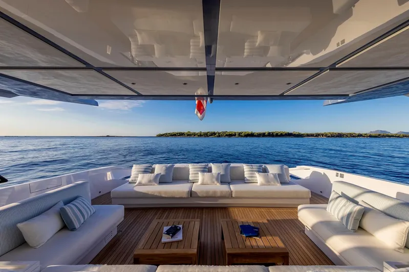 Mabelle Yacht Photos Pics Luxurious 2022 Arcadia Yachts Sherpa 80 XL with elegant outdoor seating and ocean view.