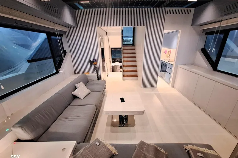 Mabelle Yacht Photos Pics Luxurious interior of 2022 Arcadia Yachts Sherpa 80 XL with modern design and spacious layout.