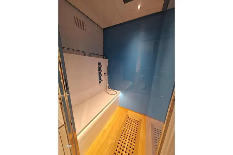 Mabelle Yacht Photos Pics Luxurious bathroom interior on 2022 Arcadia Yachts Sherpa 80 XL, featuring modern design.