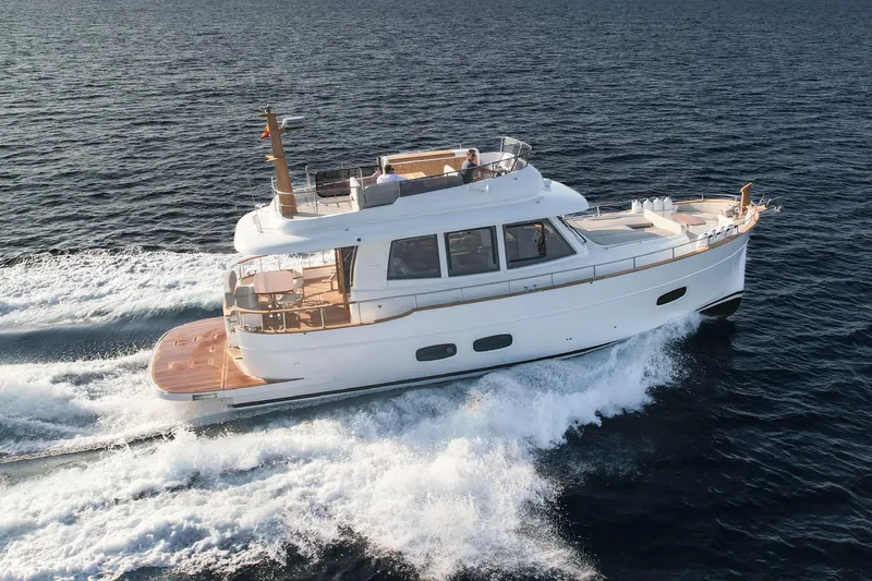  Yacht Photos Pics 2026 Sasga Yachts Menorquin 48FB cruising on open water, showcasing elegant design and performance.