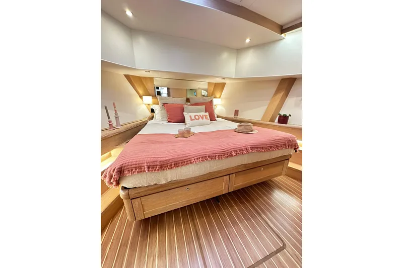  Yacht Photos Pics Luxurious 2026 Sasga Yachts Menorquin 48FB cabin with cozy bed and elegant decor.