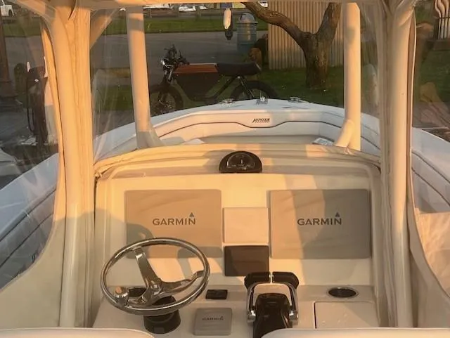  Yacht Photos Pics 2018 Jupiter 29 HFS boat cockpit with Garmin navigation system.