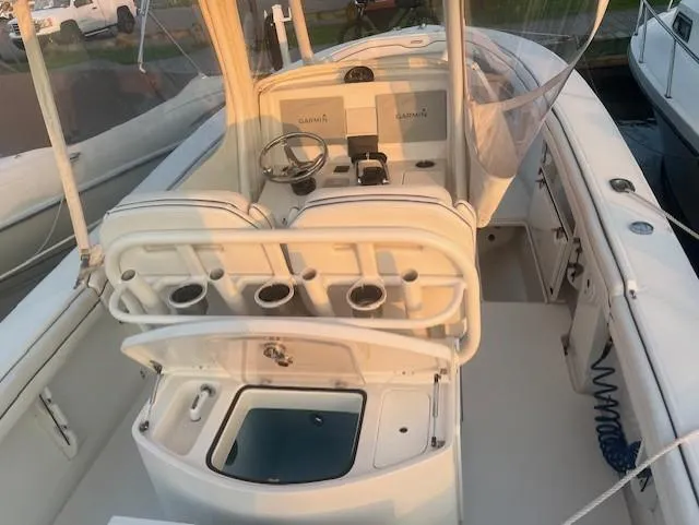  Yacht Photos Pics 2018 Jupiter 29 HFS boat interior with helm, rod holders, and seating.