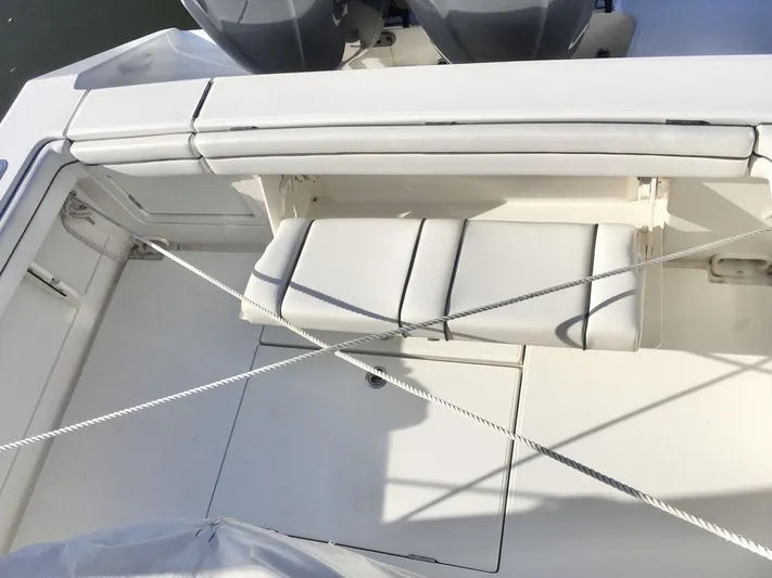  Yacht Photos Pics 2018 Jupiter 29 HFS boat interior with white seating and dual engines.