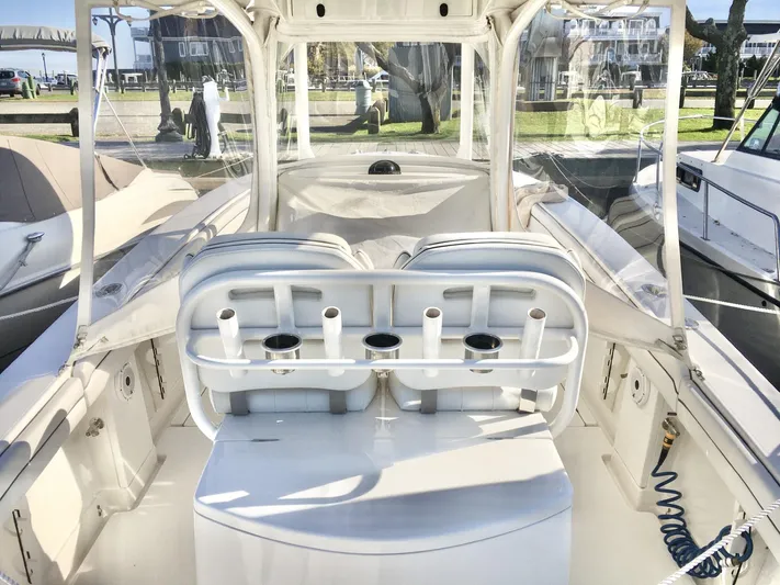  Yacht Photos Pics 2018 Jupiter 29 HFS boat interior with rod holders and seating.